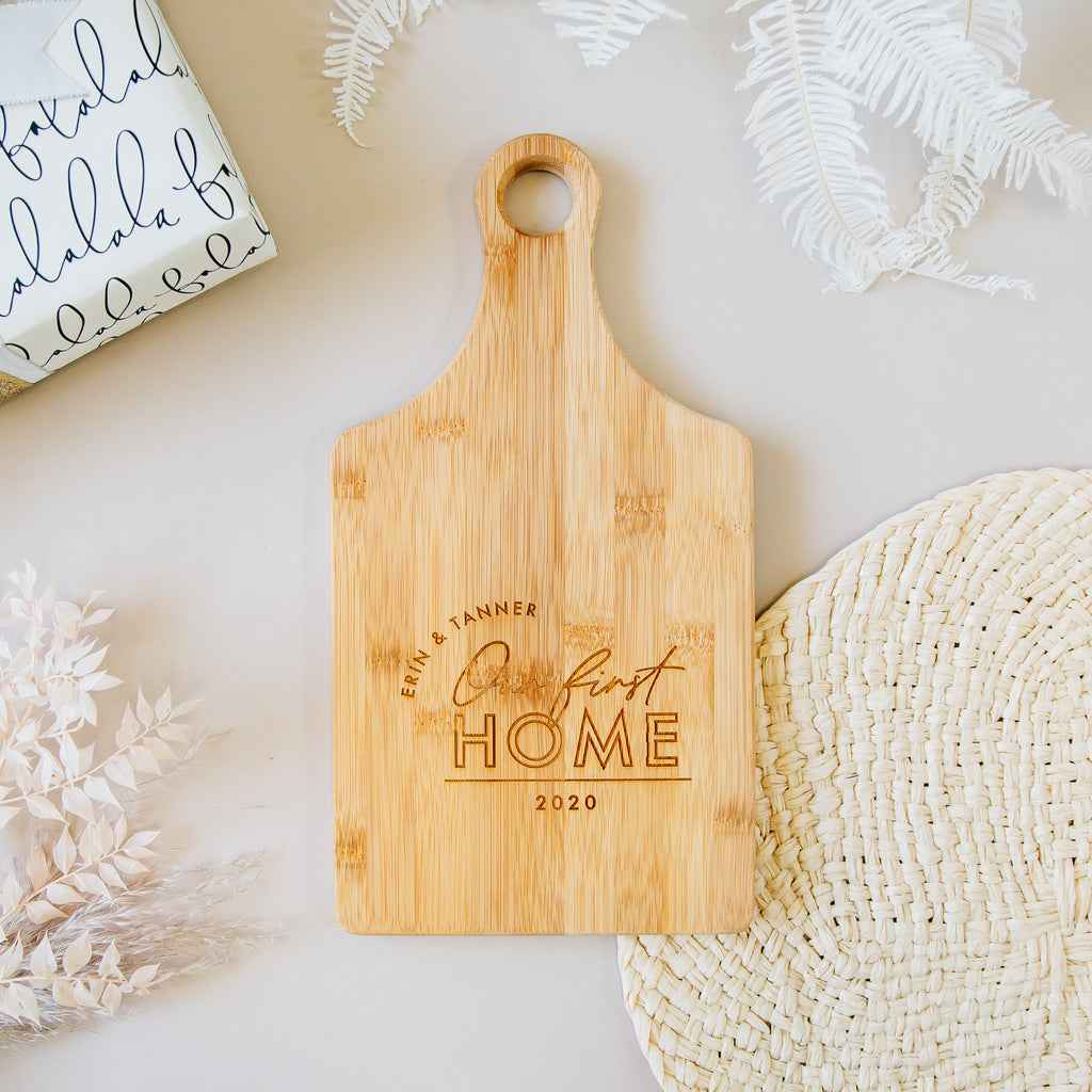 Our First Home Custom Engraved Paddle Bamboo Cutting Board
